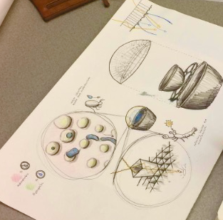 In the classroom: sketching diagrams of a lobster-inspired device that could harvest desalinated water.